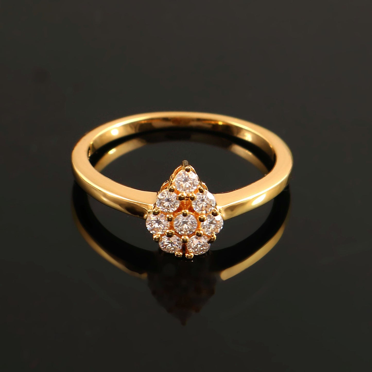 Pear shape round moissanite gold ring