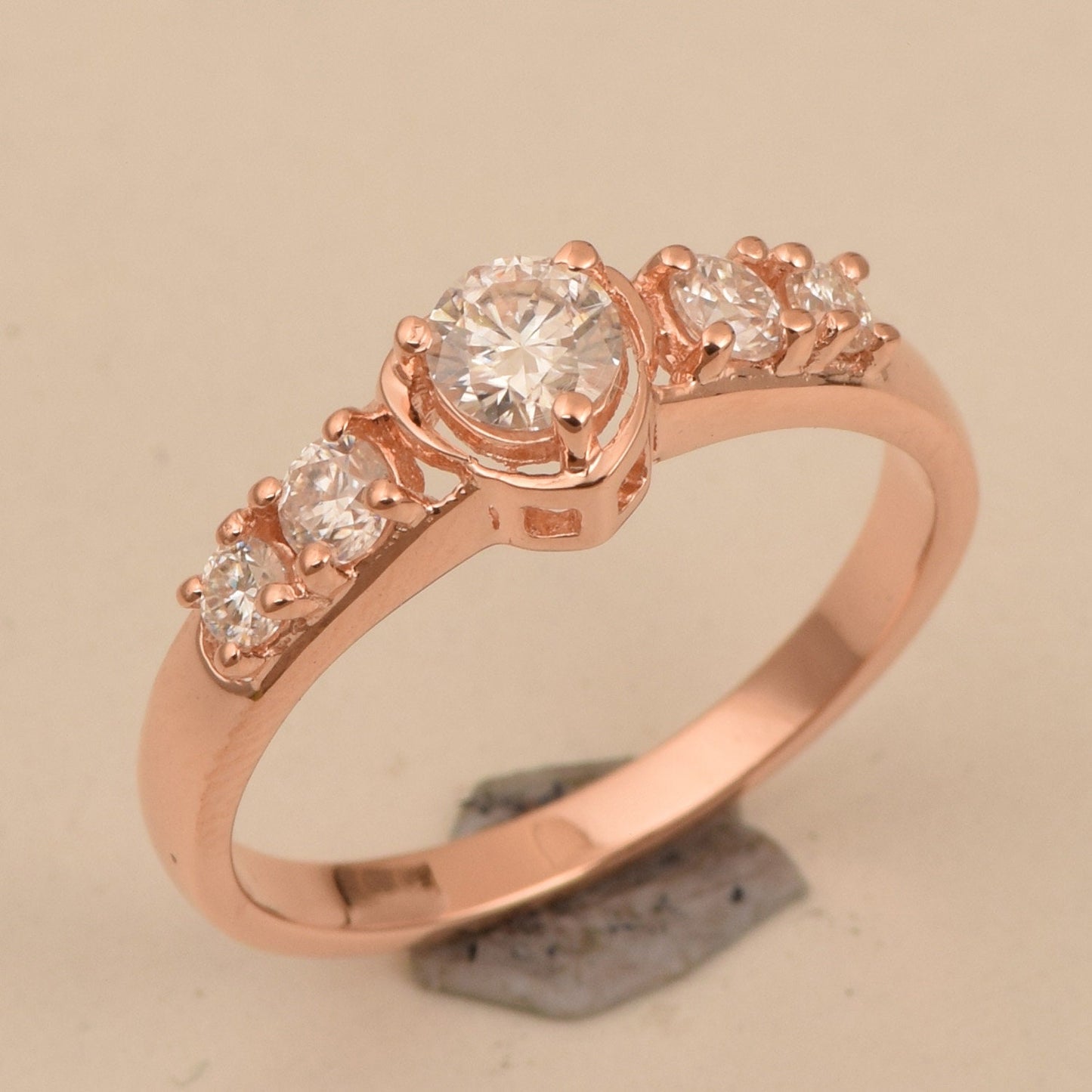 Round moissanite ring with side stones