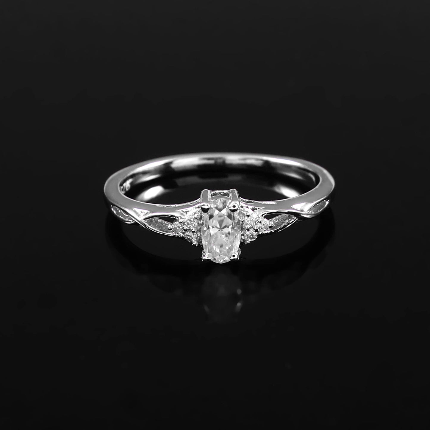 Dainty Oval Moissanite Ring set in Gold