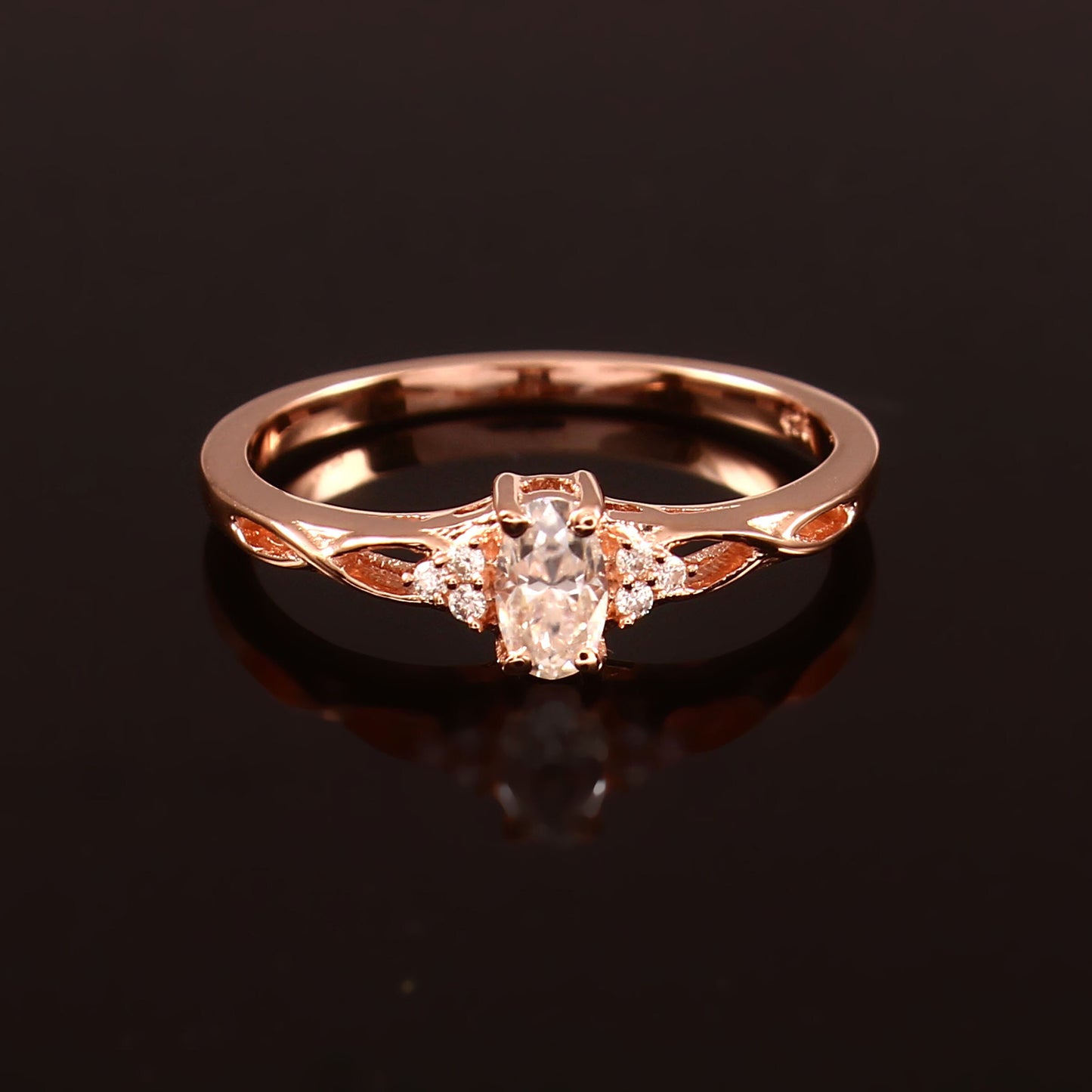 Dainty Oval Moissanite Ring set in Gold